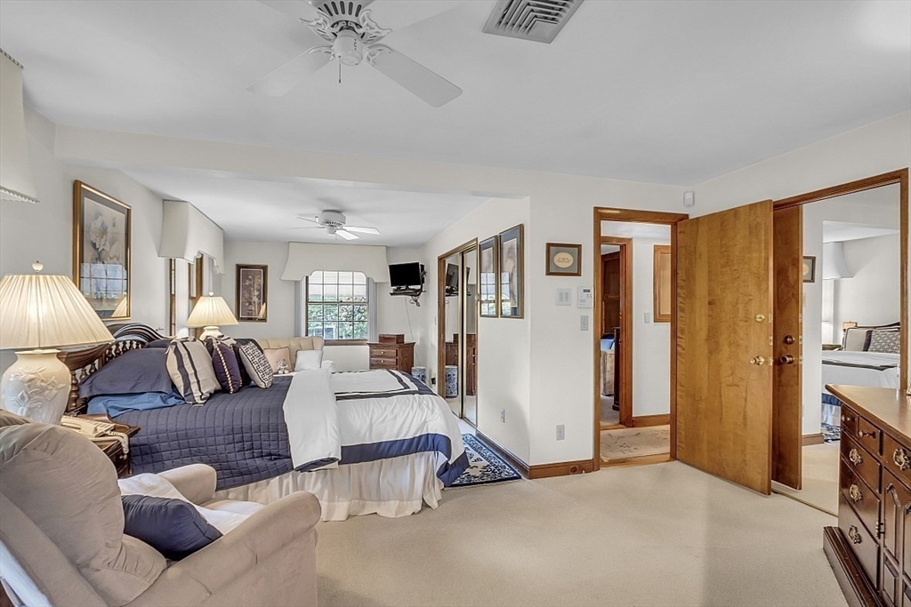 4 Belfast Road Peabody, MA 01960 - Photo 19 of 34 a living room with furniture gym equipment and a window