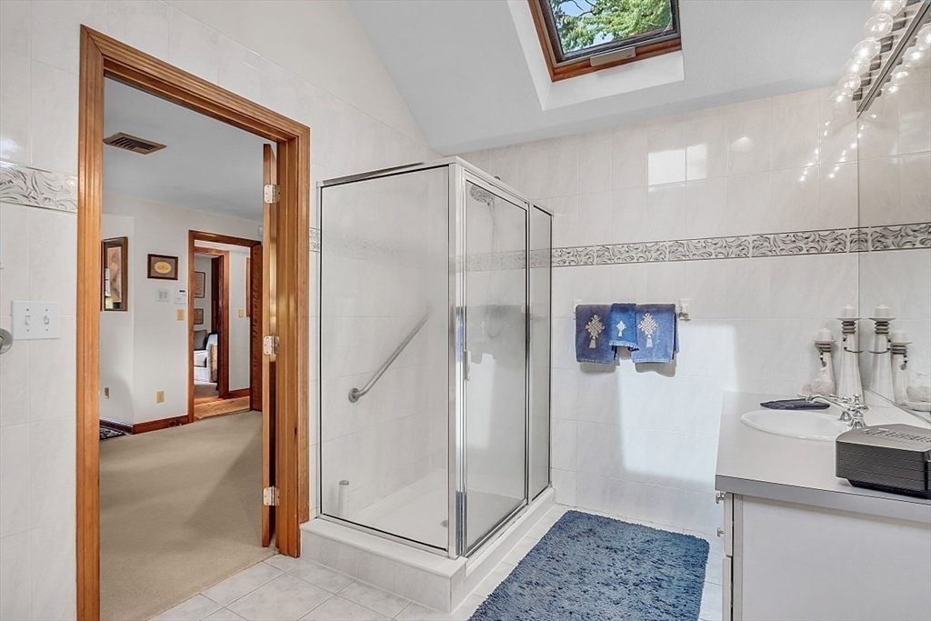 4 Belfast Road Peabody, MA 01960 - Photo 21 of 34 a en suite bathroom with a shower sink and mirror