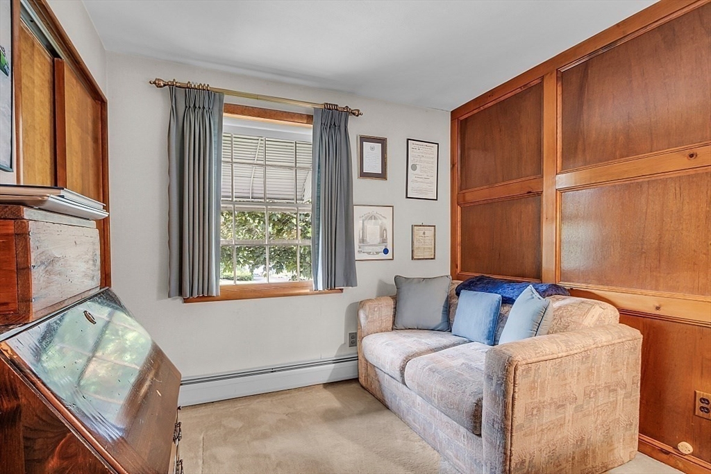 4 Belfast Road Peabody, MA 01960 - Photo 22 of 34 a living room with furniture and a window
