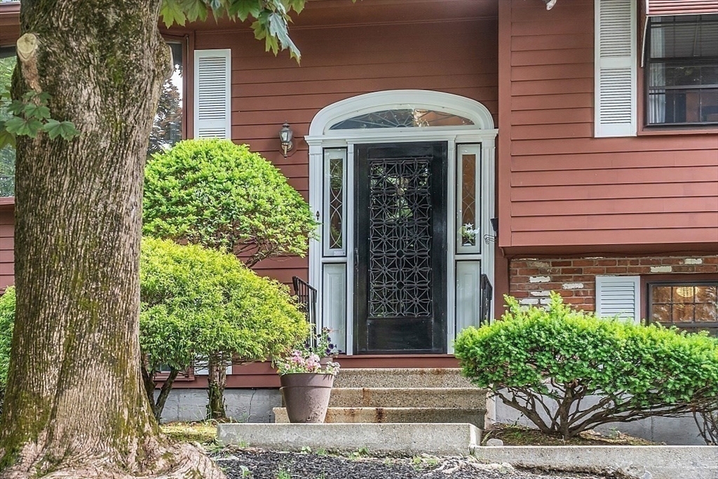 4 Belfast Road Peabody, MA 01960 - Photo 3 of 34 a front view of a house with garden
