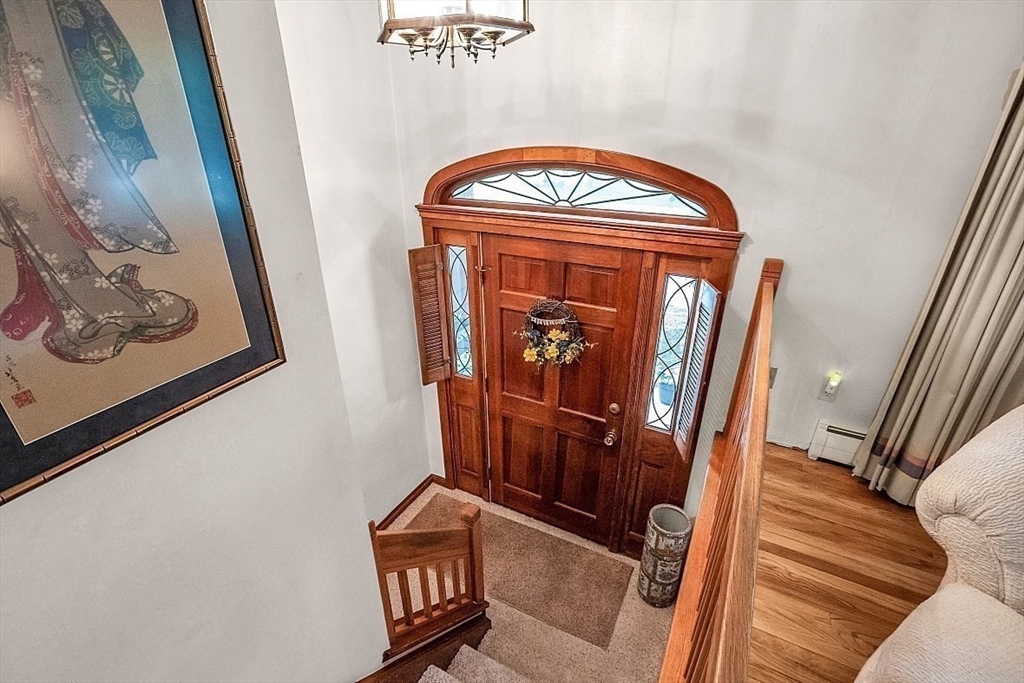 4 Belfast Road Peabody, MA 01960 - Photo 4 of 34 a view of front door with wooden floor