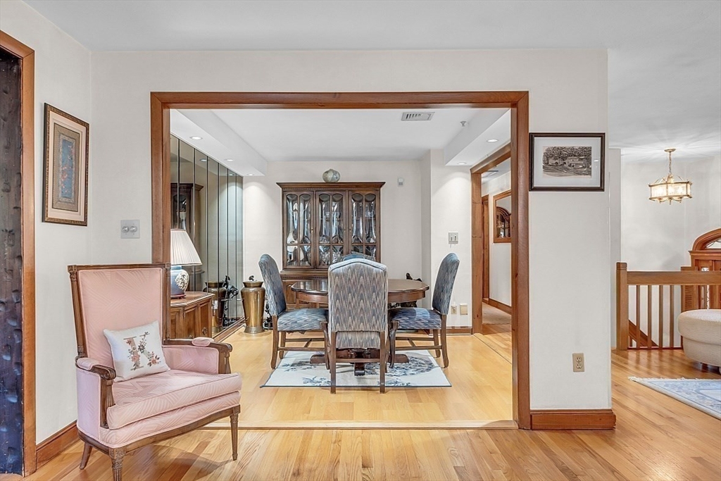 4 Belfast Road Peabody, MA 01960 - Photo 7 of 34 a living room with furniture a wooden floor and next to a window