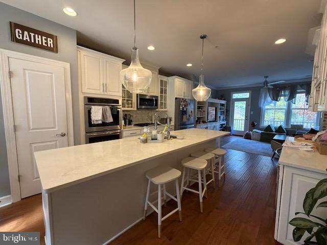 4638 Woodberry Street Riverdale, MD 20737 - Photo 19 of 78 Modern kitchen with inviting ambiance.