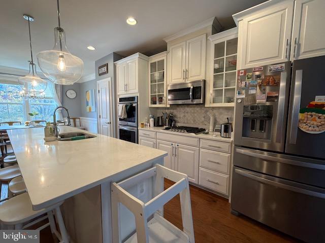 4638 Woodberry Street Riverdale, MD 20737 - Photo 20 of 78 Modern kitchen with sleek white cabinetry.