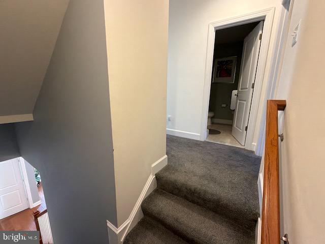 4638 Woodberry Street Riverdale, MD 20737 - Photo 30 of 78 Inviting staircase leading to private spaces.