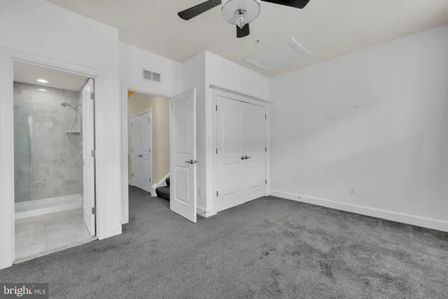 a view of a two chairs in the patio