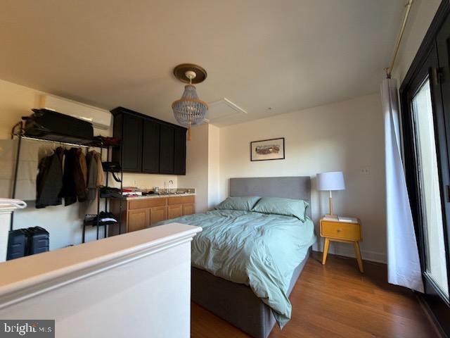 4638 Woodberry Street Riverdale, MD 20737 - Photo 48 of 78 Cozy bedroom with modern charm and light.