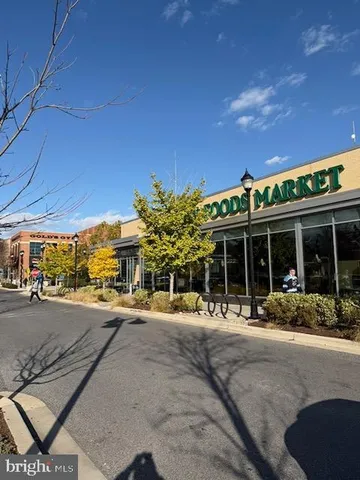 a view of a building with sitting area