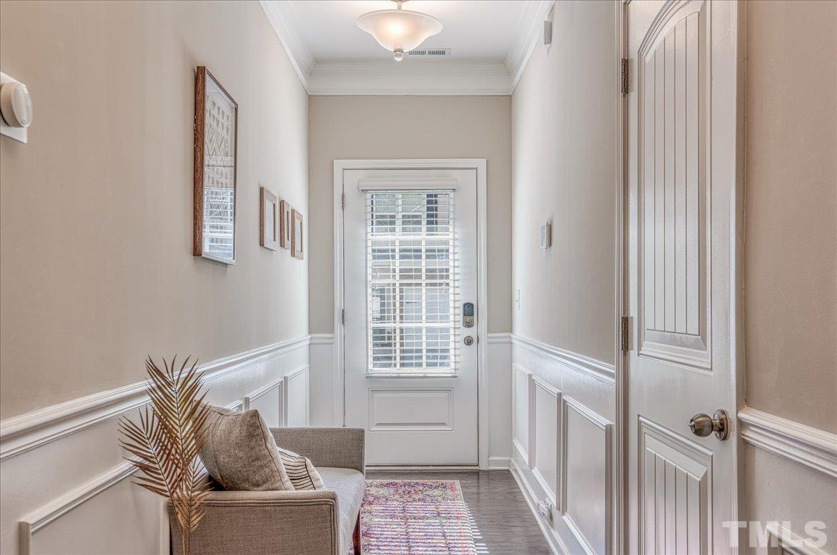 6328 Grace Lily Drive Raleigh, NC 27607 - Photo 2 of 27 a view of livingroom with furniture and windows