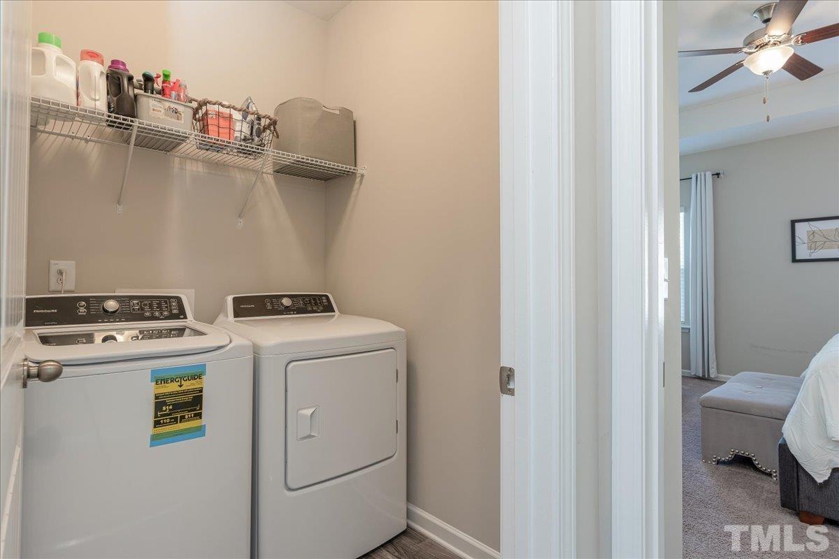 6328 Grace Lily Drive Raleigh, NC 27607 - Photo 18 of 27 a utility room with dryer and washer