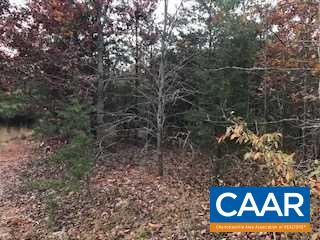 Lot 92 Bell Road Dillwyn, VA 23936 - Photo 2 of 4 a sign that is sitting on a brick wall