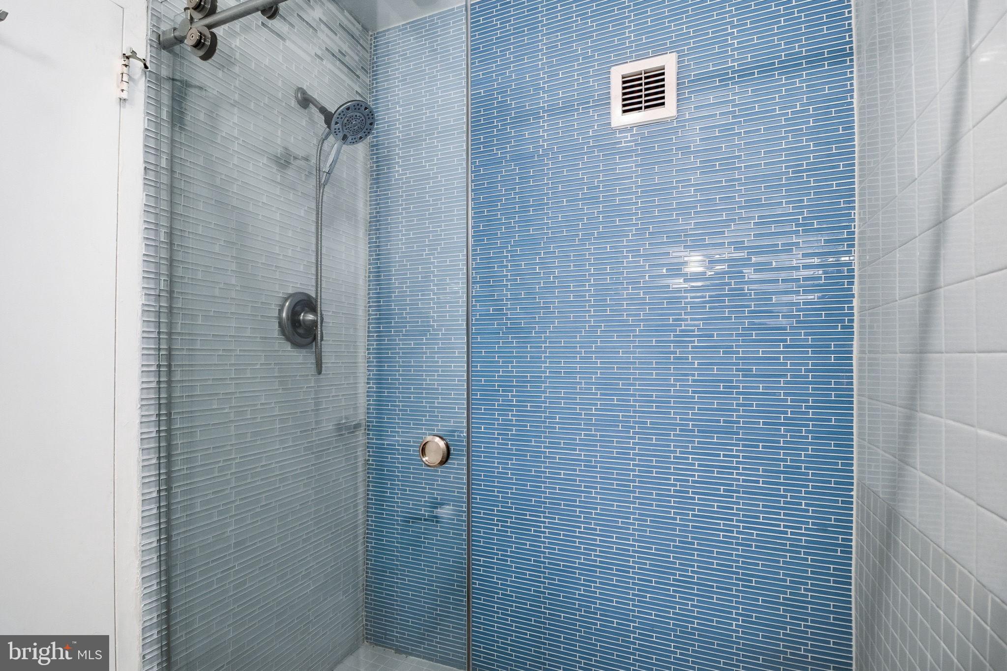 4100 Cathedral Avenue Northwest, Unit 818 Washington, DC 20016 - Photo 10 of 15 a bathroom with a shower