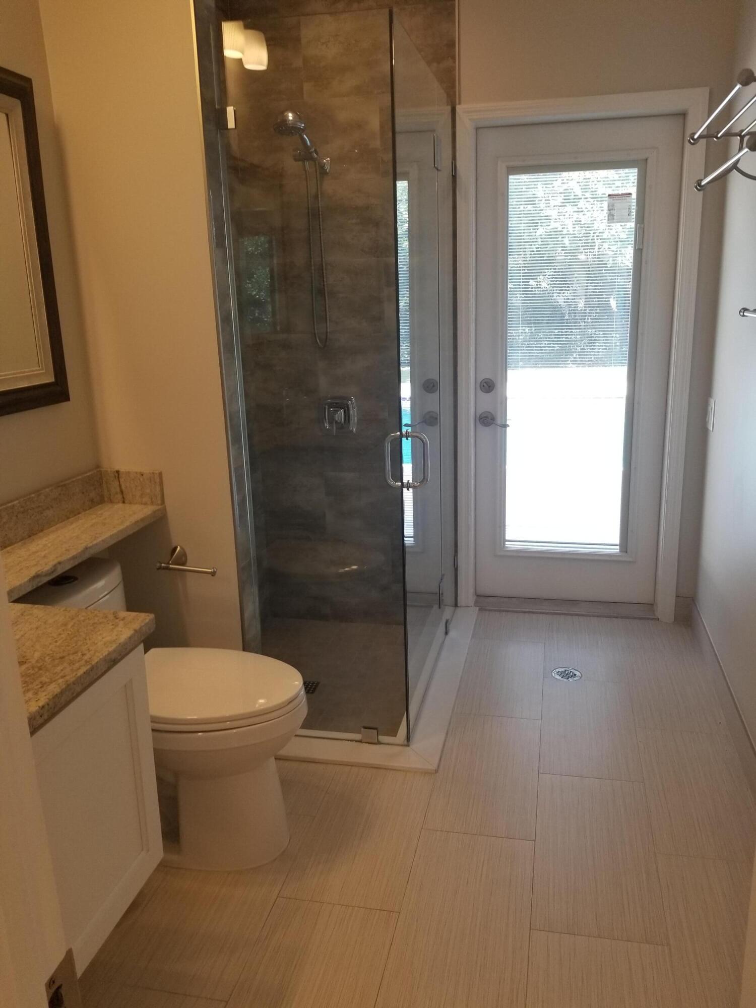 8709 Man O War Road Palm Beach Gardens, FL 33418 - Photo 26 of 27 cabana bath