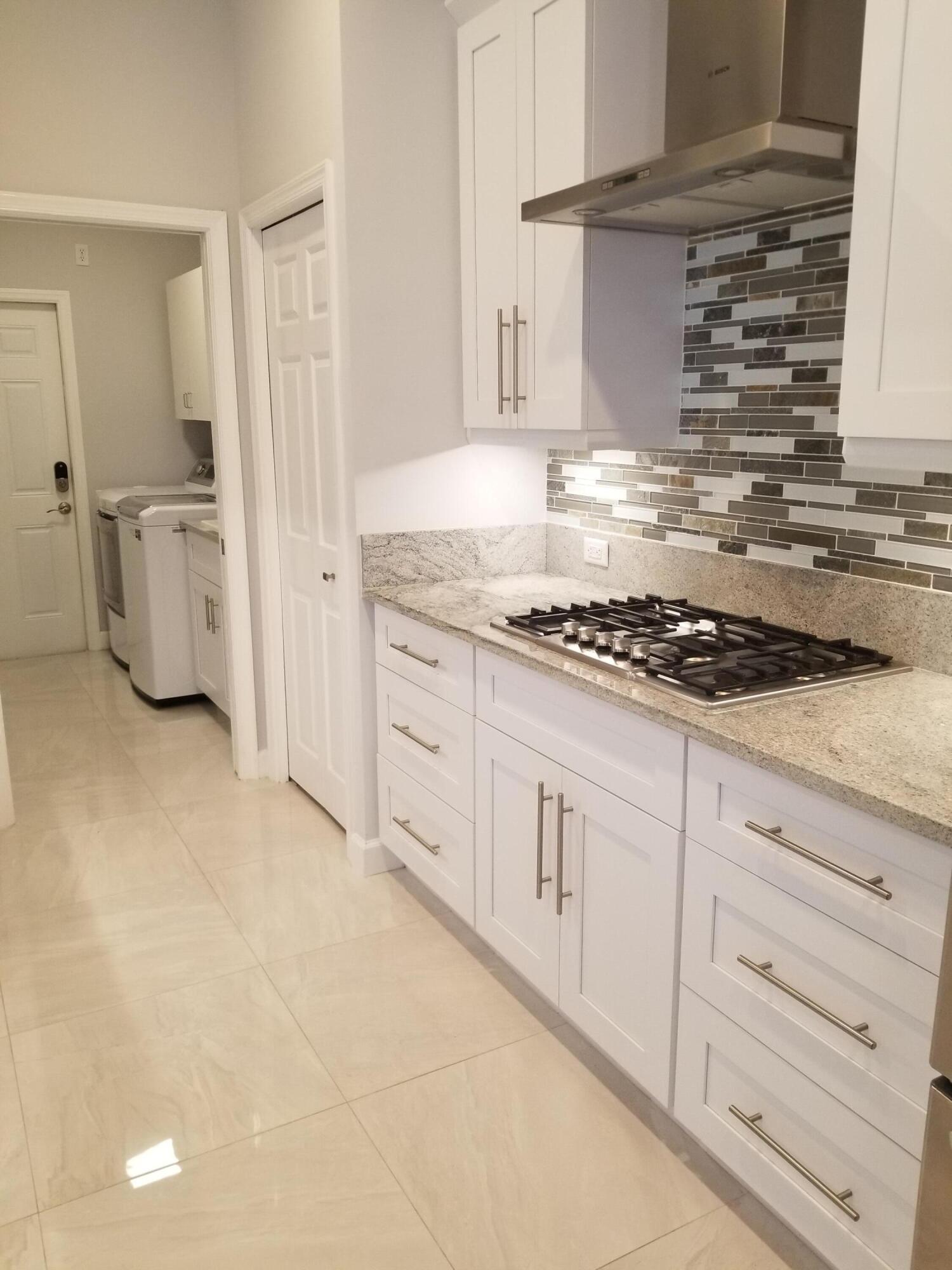 8709 Man O War Road Palm Beach Gardens, FL 33418 - Photo 4 of 27 Kitchen cooktop