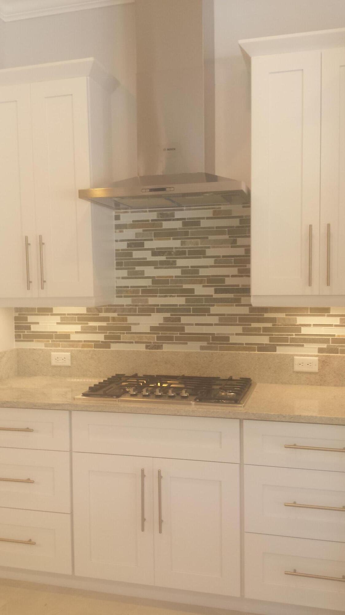 8709 Man O War Road Palm Beach Gardens, FL 33418 - Photo 8 of 27 kitchen3