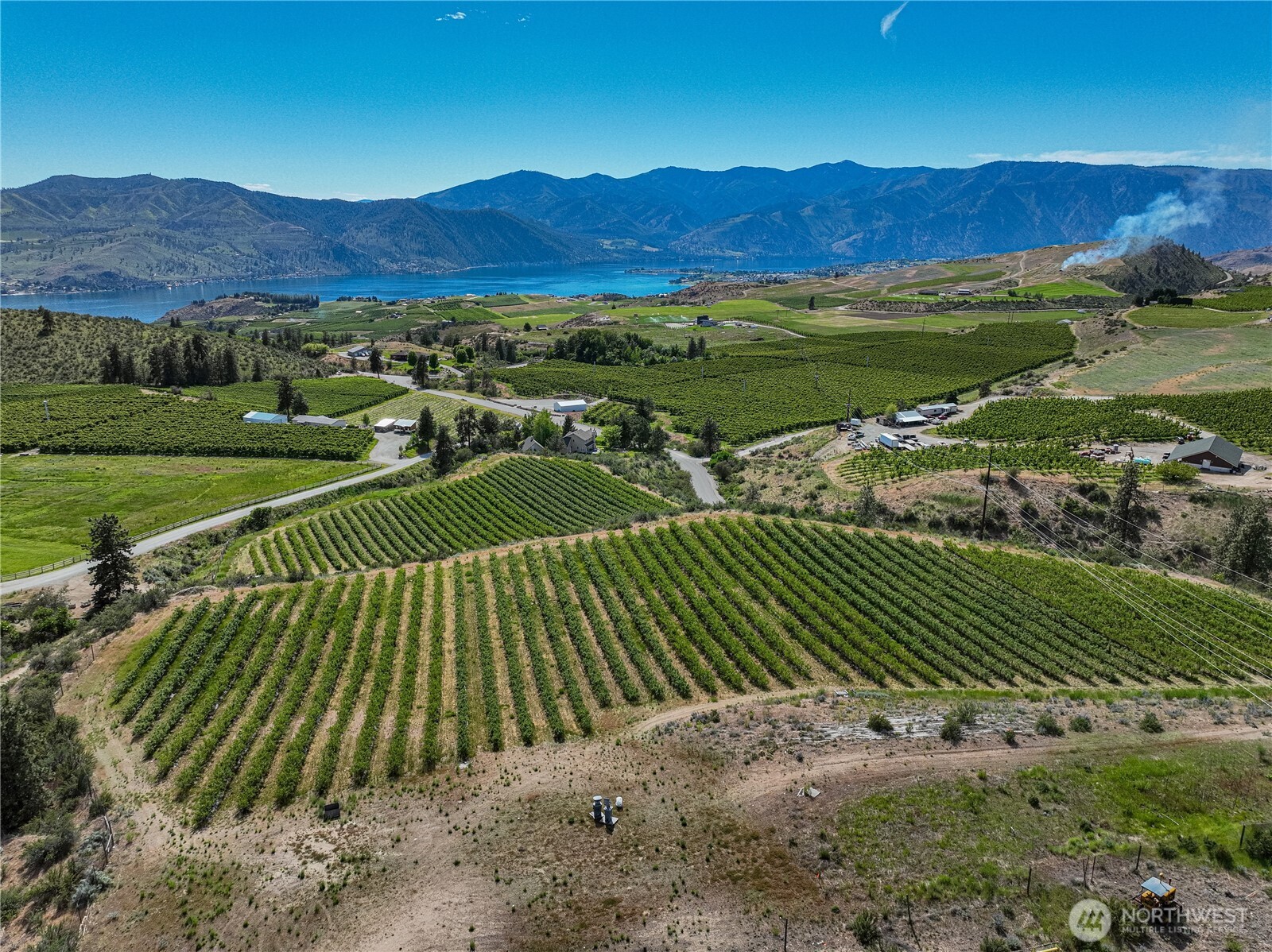 173 Chelan Ranch Road Chelan, WA 98816 - Photo 6 of 11 a view of a golf course with a garden