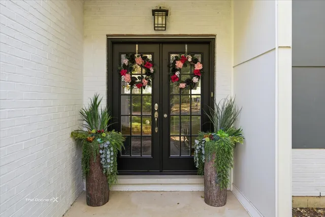 a kitchen with kitchen island a counter top space and a refrigerator