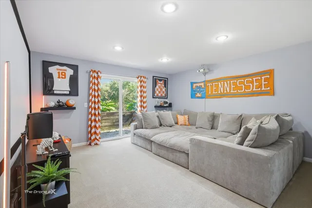 a bathroom with a granite countertop shower a sink and a mirror