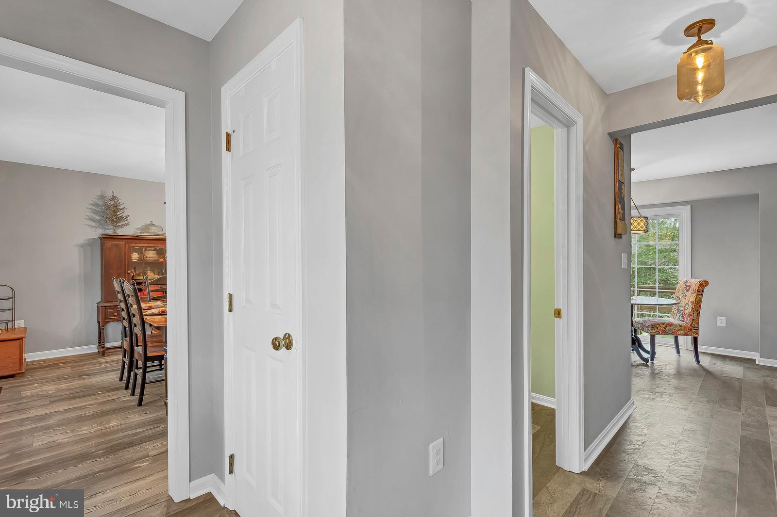 537 Platte Road Lusby, MD 20657 - Photo 5 of 33 a view of a hallway view with wooden floor and furniture