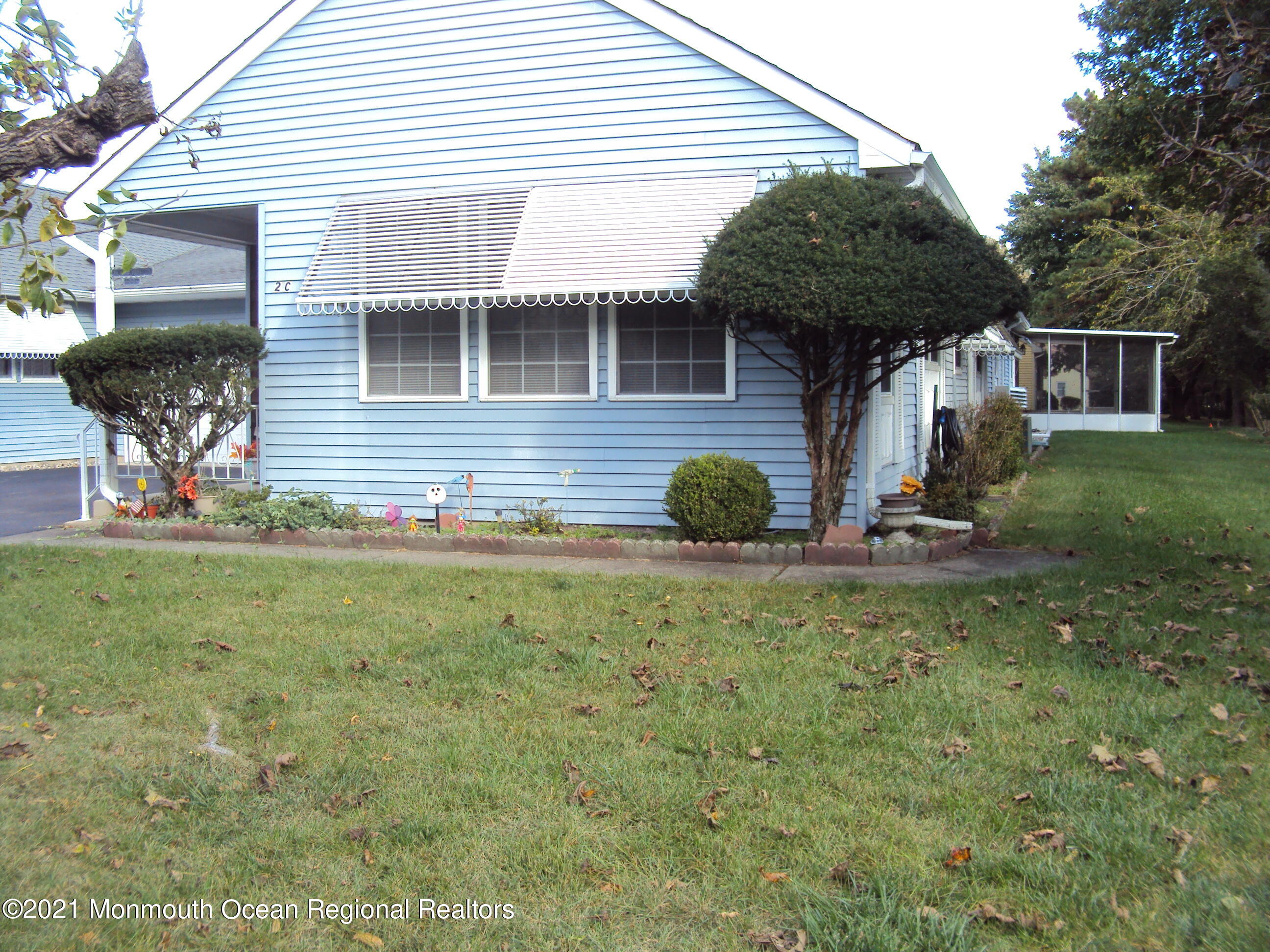 2B Stonybrook Road, Unit C Whiting, NJ 08759 - Photo 2 of 16 a view of a house with a yard