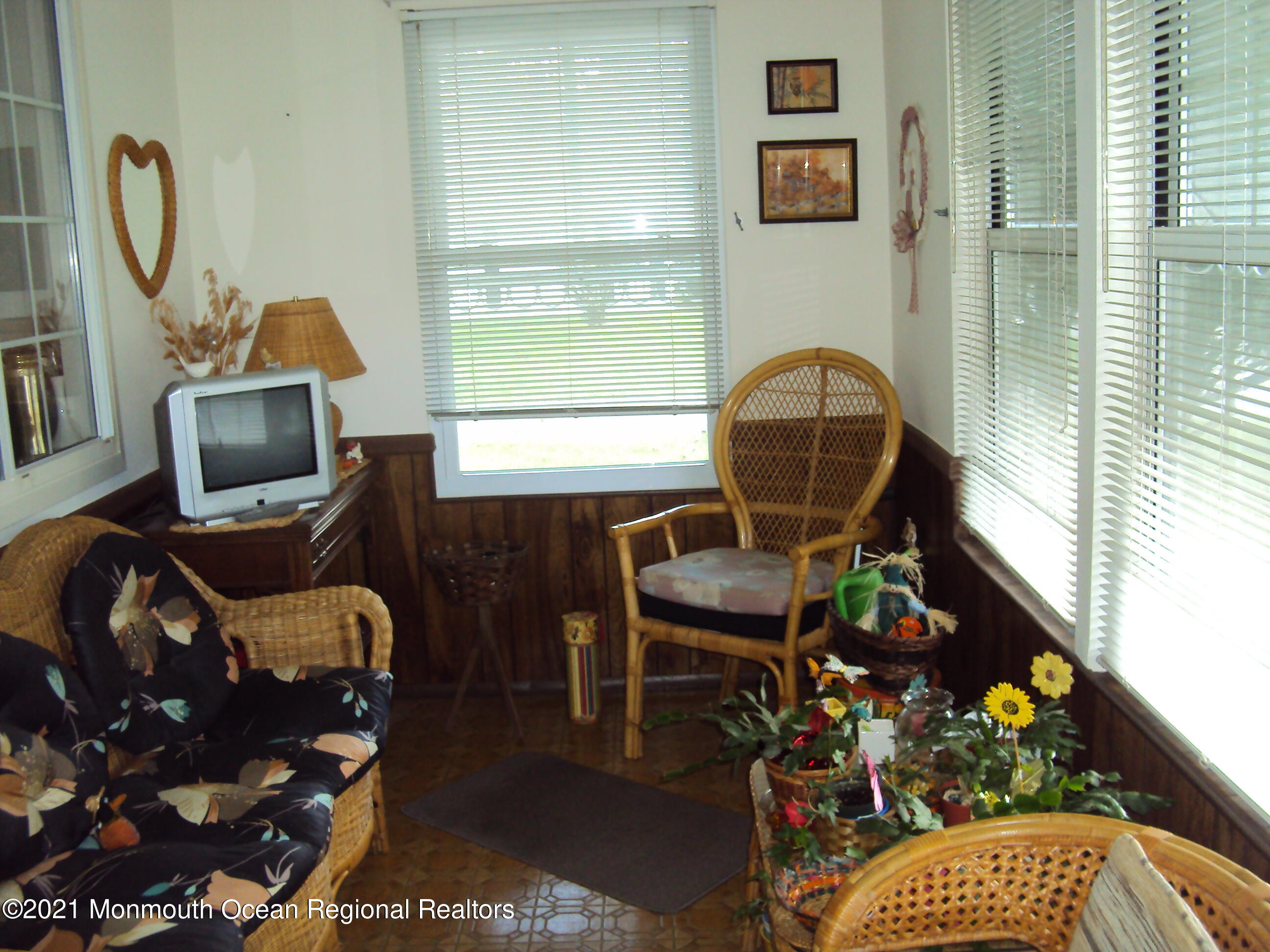 2B Stonybrook Road, Unit C Whiting, NJ 08759 - Photo 3 of 16 a living room with furniture a rug and a window