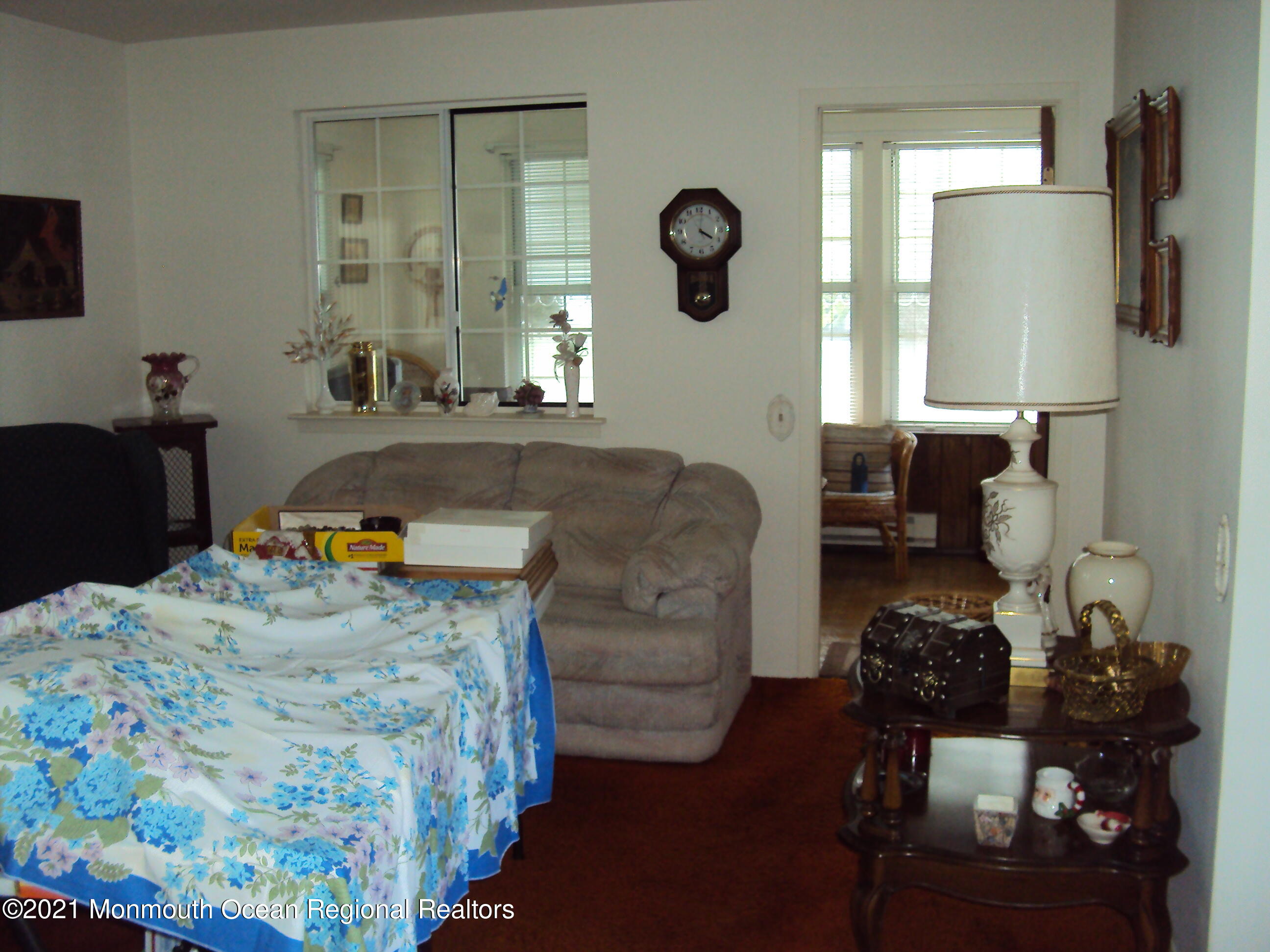 2B Stonybrook Road, Unit C Whiting, NJ 08759 - Photo 4 of 16 a living room with furniture and a mirror