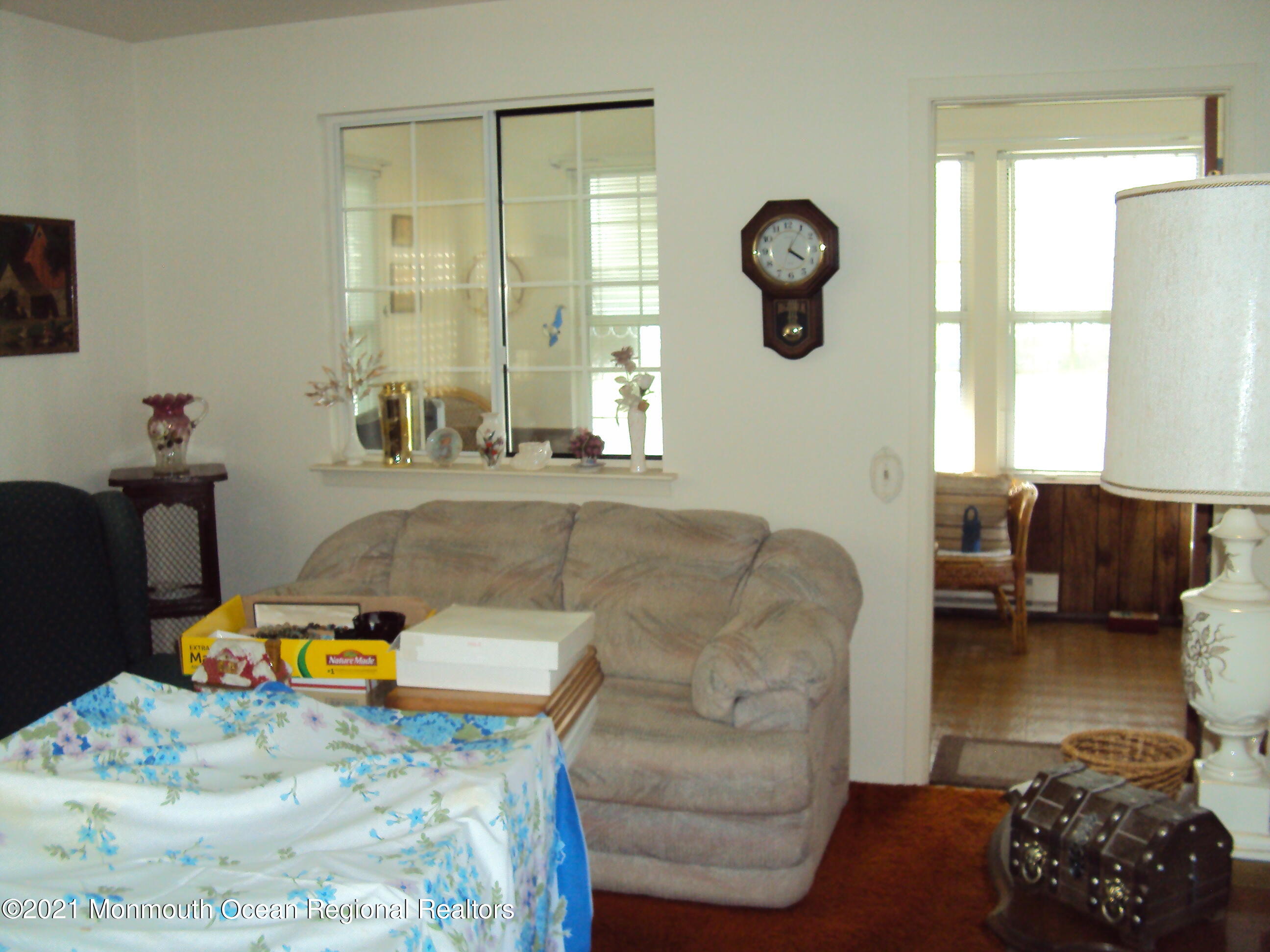 2B Stonybrook Road, Unit C Whiting, NJ 08759 - Photo 6 of 16 a living room with furniture and a window