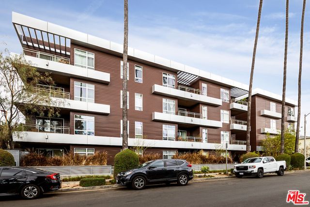 a car parked in front of a building