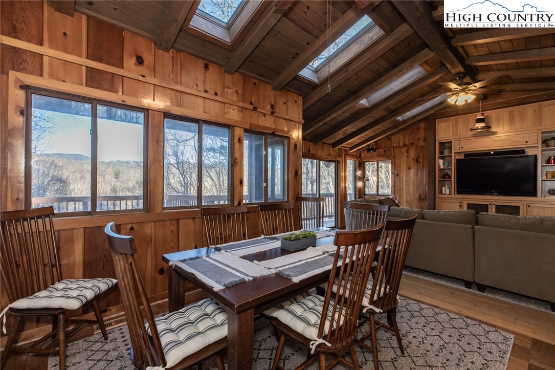 107 Buckshot Ridge Road Deep Gap, NC 28618 - Photo 14 of 30 a view of a dining room with furniture window and outside view