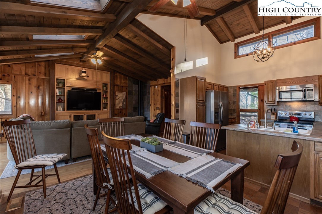 107 Buckshot Ridge Road Deep Gap, NC 28618 - Photo 15 of 30 a view of a dining room with furniture