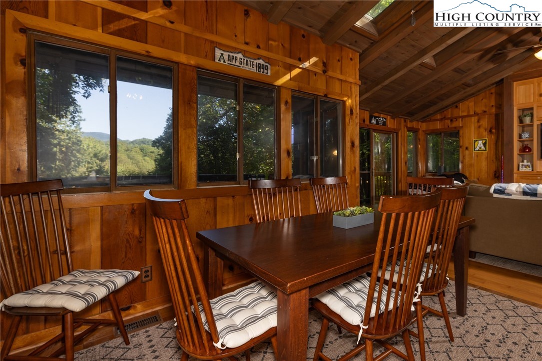 107 Buckshot Ridge Road Deep Gap, NC 28618 - Photo 4 of 30 a view of a patio with a table and chairs