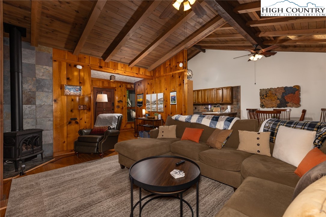 107 Buckshot Ridge Road Deep Gap, NC 28618 - Photo 5 of 30 a living room with furniture and a flat screen tv