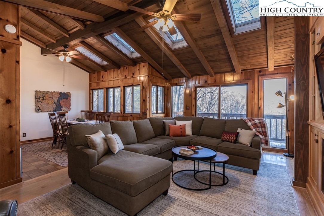 107 Buckshot Ridge Road Deep Gap, NC 28618 - Photo 10 of 30 a living room with furniture and a large window
