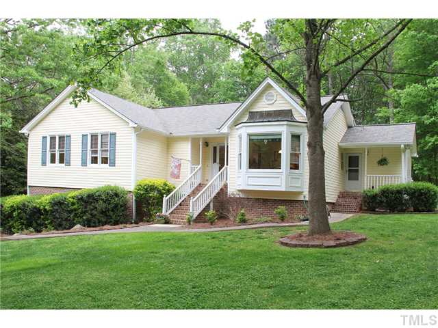 2025 Lovdal Drive Raleigh, NC 27613 - Photo 1 of 15 a view of a house with a yard and large tree