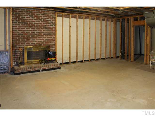 2025 Lovdal Drive Raleigh, NC 27613 - Photo 14 of 15 a view of a livingroom with fireplace