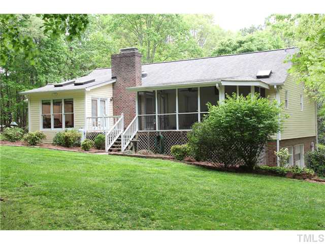 2025 Lovdal Drive Raleigh, NC 27613 - Photo 5 of 15 a view of a house with a yard and sitting area