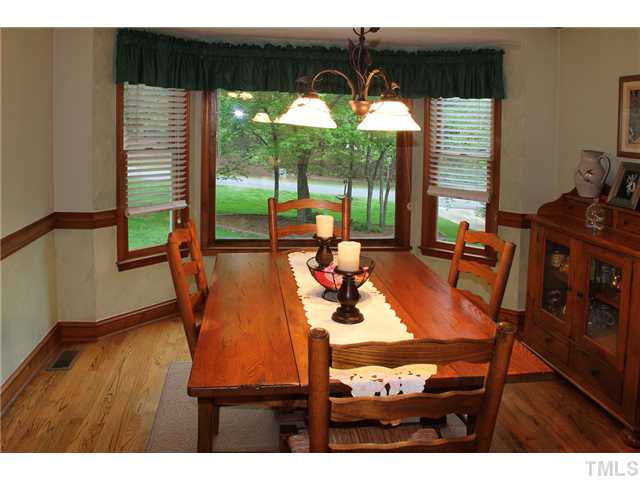 2025 Lovdal Drive Raleigh, NC 27613 - Photo 9 of 15 a view of a dining room with furniture window and outside view