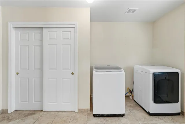a utility room with a washer and dryer