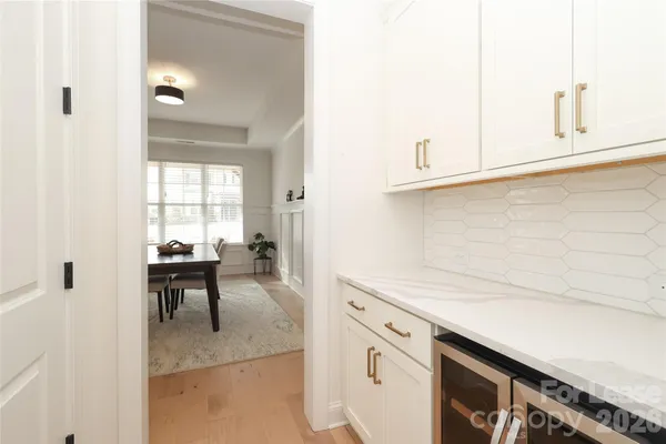 a kitchen with a sink cabinets and appliances