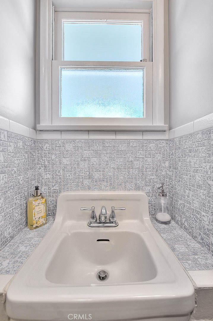 4845 Granada Avenue Riverside, CA 92504 - Photo 25 of 56 a bathroom with a sink