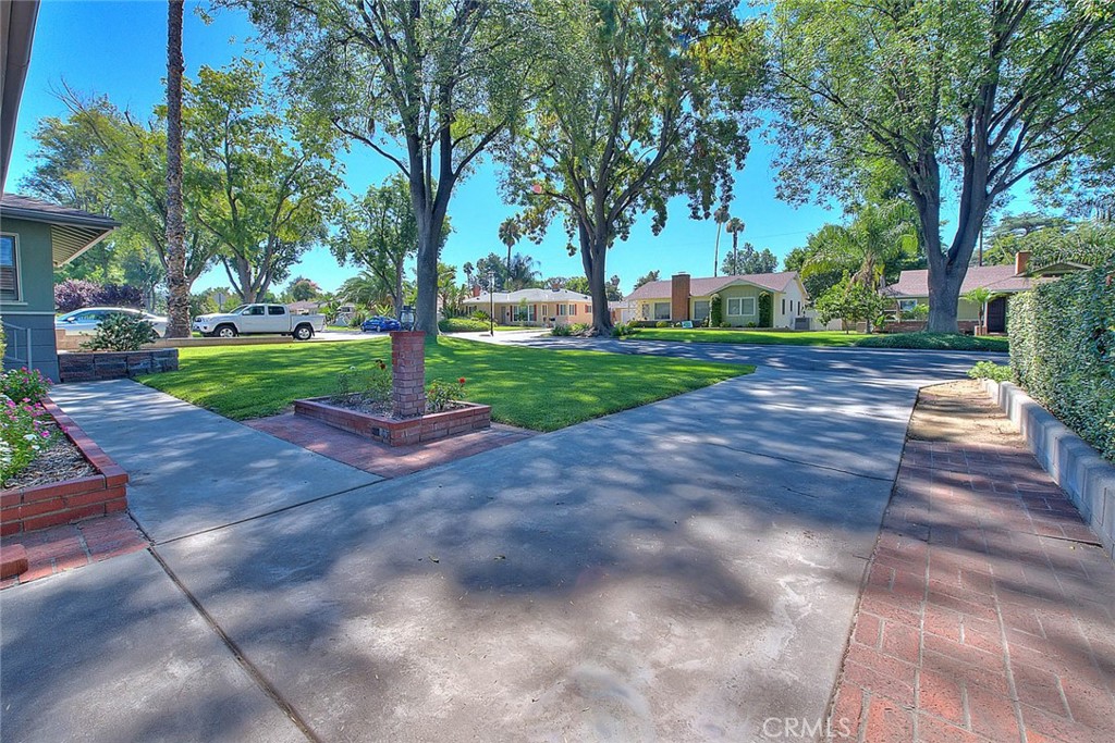4845 Granada Avenue Riverside, CA 92504 - Photo 39 of 56 a view of a yard with plants and trees