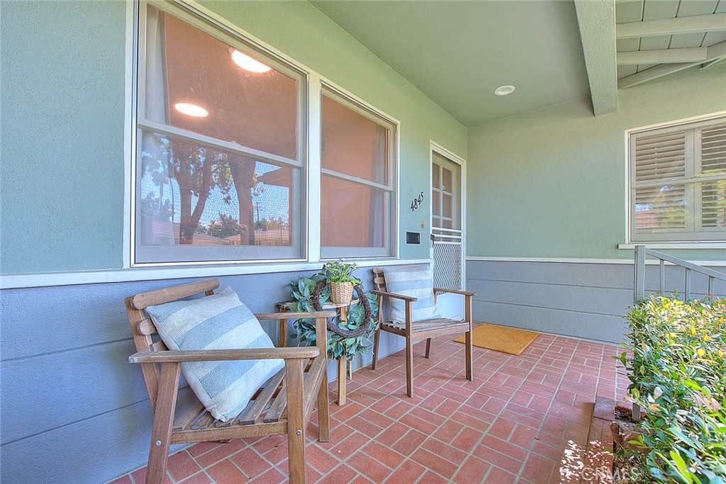 4845 Granada Avenue Riverside, CA 92504 - Photo 40 of 56 a living room with furniture and a potted plant