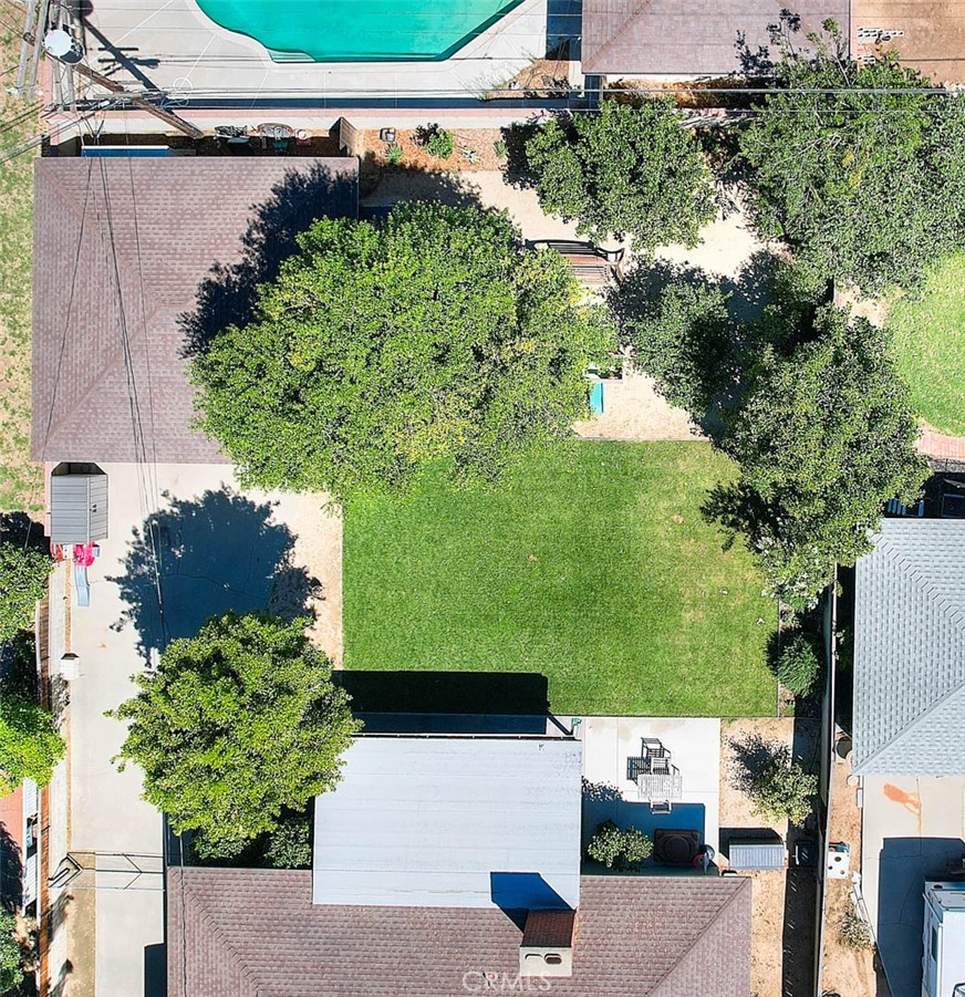 4845 Granada Avenue Riverside, CA 92504 - Photo 4 of 56 an aerial view of a house with a yard and garden