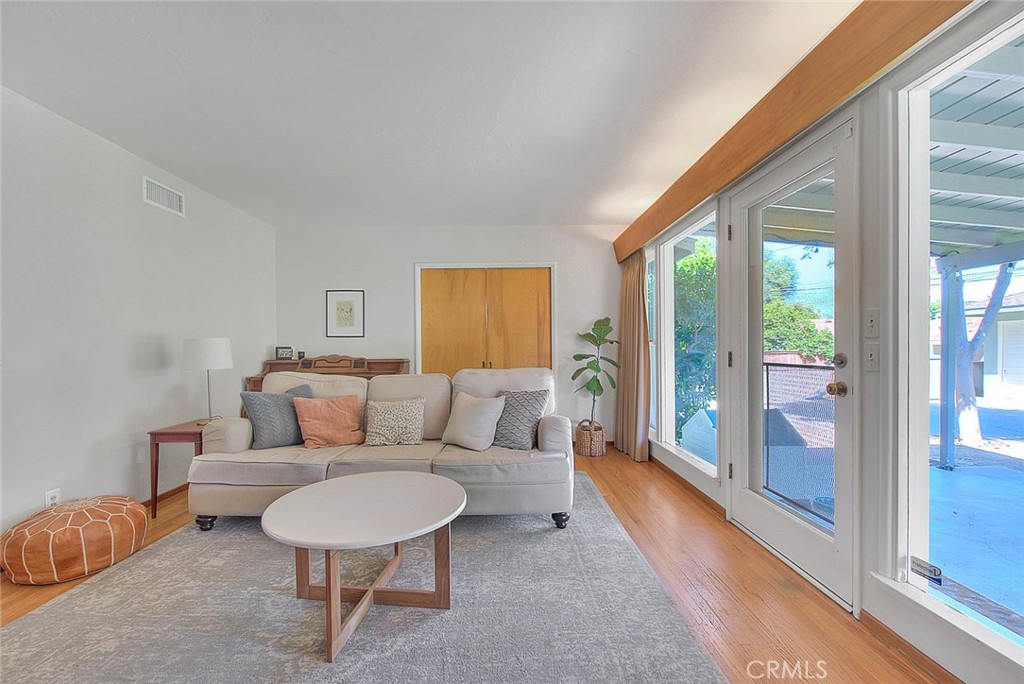 4845 Granada Avenue Riverside, CA 92504 - Photo 43 of 56 a living room with furniture and a large window