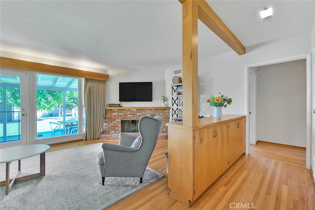 4845 Granada Avenue Riverside, CA 92504 - Photo 44 of 56 a living room with furniture and a fireplace