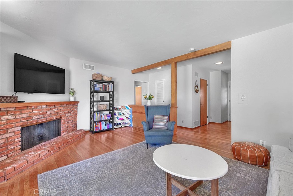 4845 Granada Avenue Riverside, CA 92504 - Photo 45 of 56 a living room with furniture and a flat screen tv