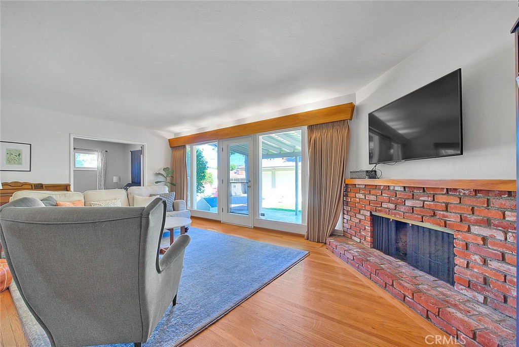 4845 Granada Avenue Riverside, CA 92504 - Photo 49 of 56 a living room with furniture and a flat screen tv