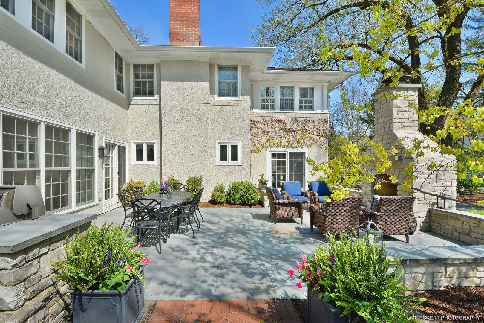 580 Washington Road Lake Forest, IL 60045 - Photo 40 of 46 front view of a house with a chairs in a patio