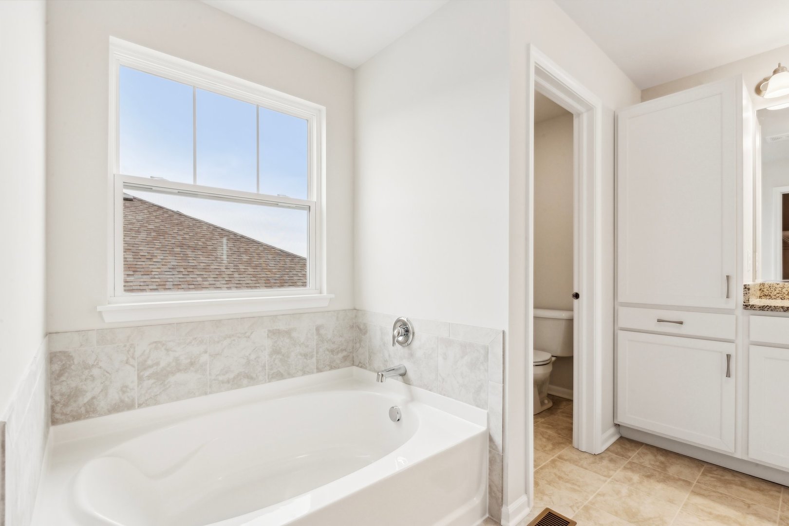 737 Cherry Circle Elburn, IL 60119 - Photo 41 of 50 a white bath tub sitting in a bathroom