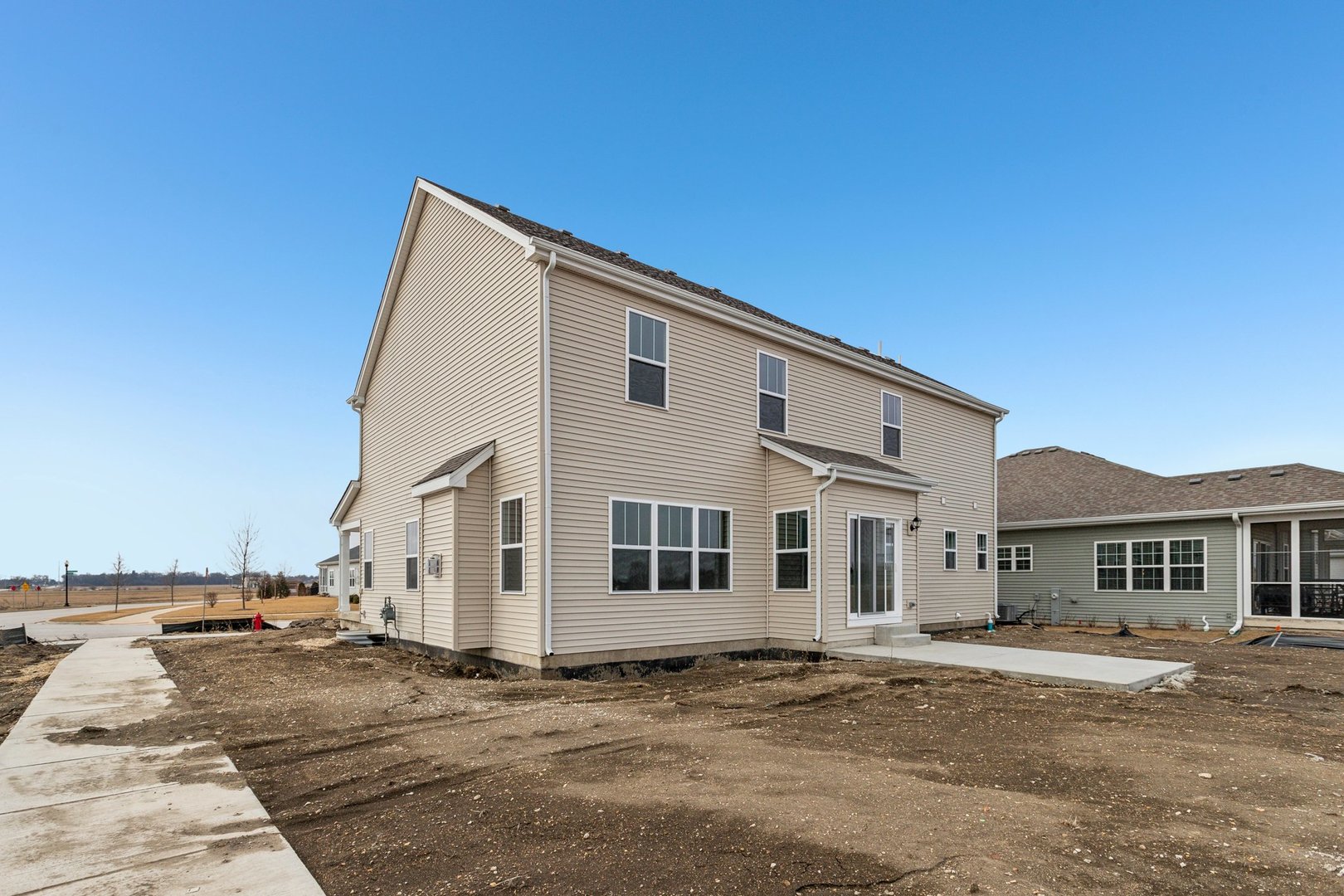 737 Cherry Circle Elburn, IL 60119 - Photo 48 of 50 a front view of a house with a yard